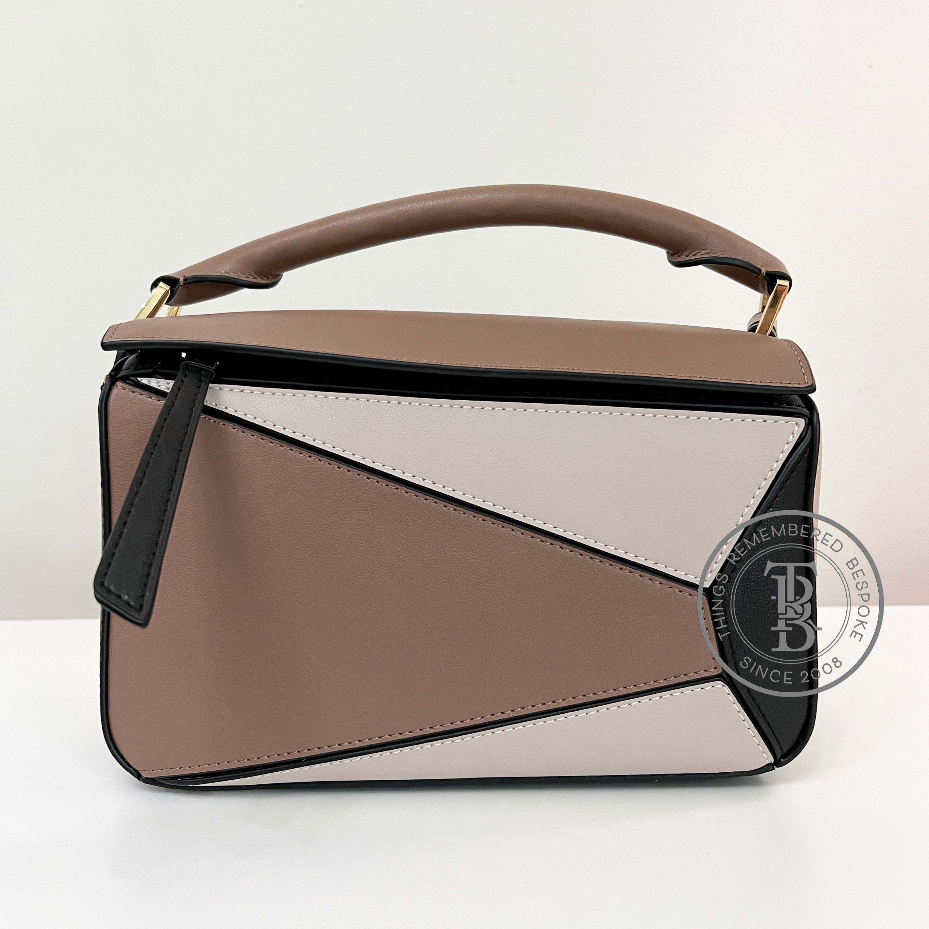 Introducing 'TRIO' mini bag - unique in its design, creates a beautiful  geometric balance with its triangular form and versatility to…